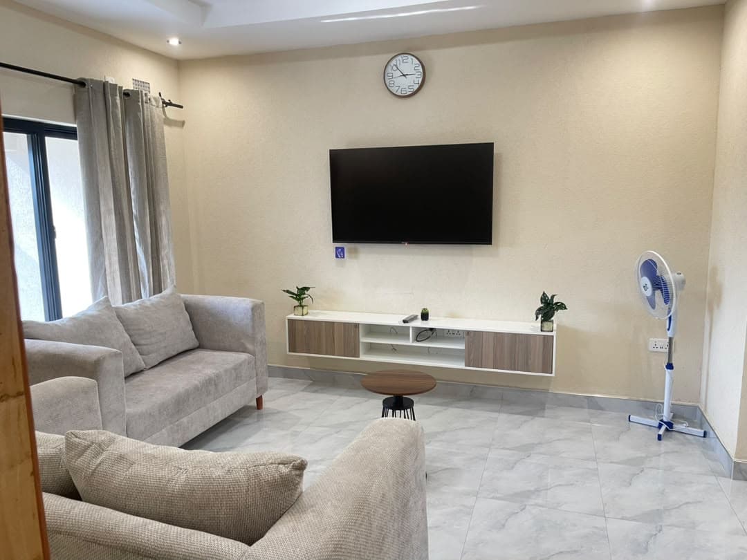 Parklands Apartments Livingstone — Living space opening onto the kitchen