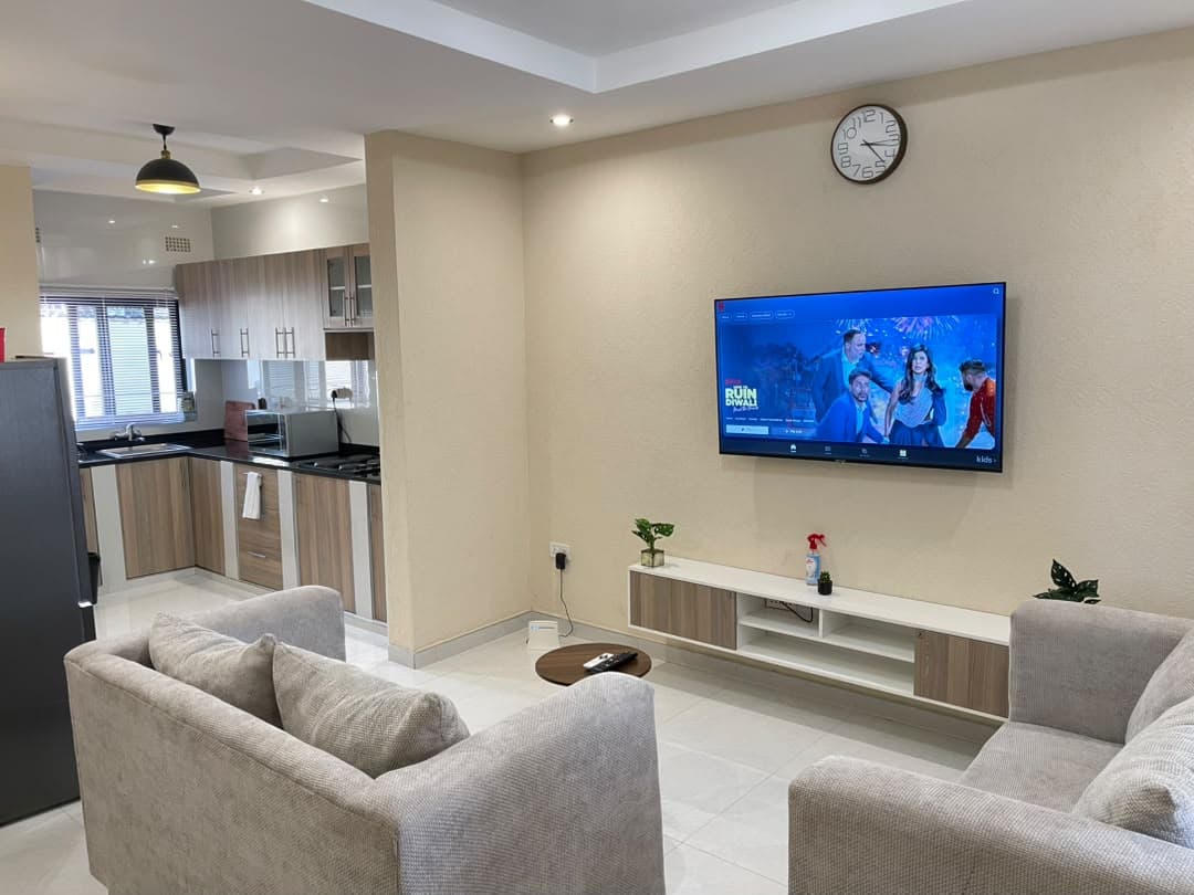 Parklands Apartments Livingstone — Apartment B lounge — smart TV with Netflix ready to stream